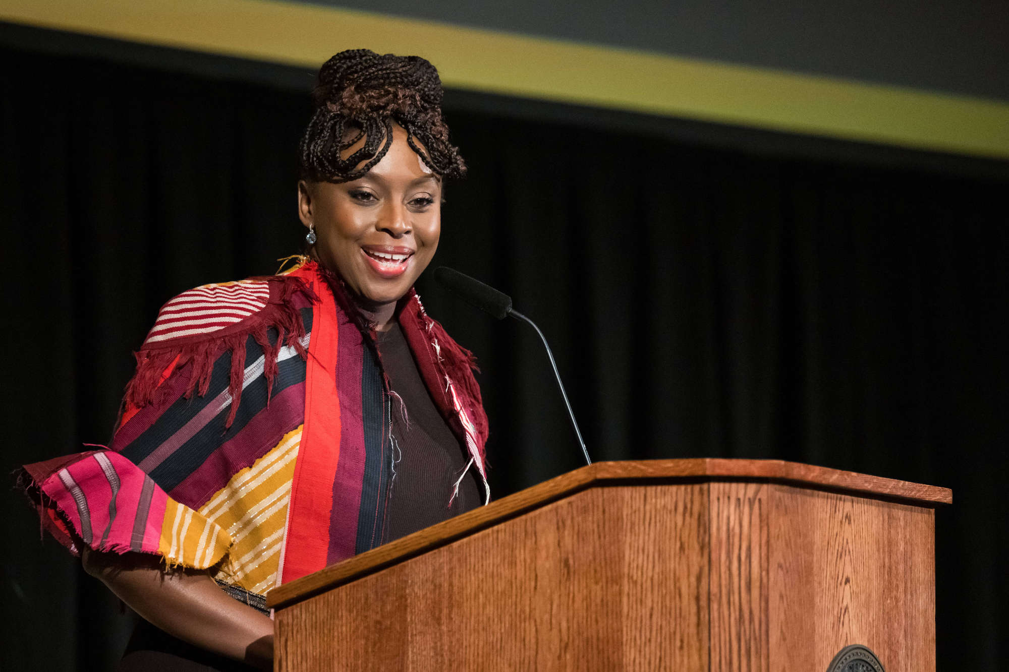 Chimamanda Negozi Adichie delivers a lecture at a podium during Meliora Weekend 2023.