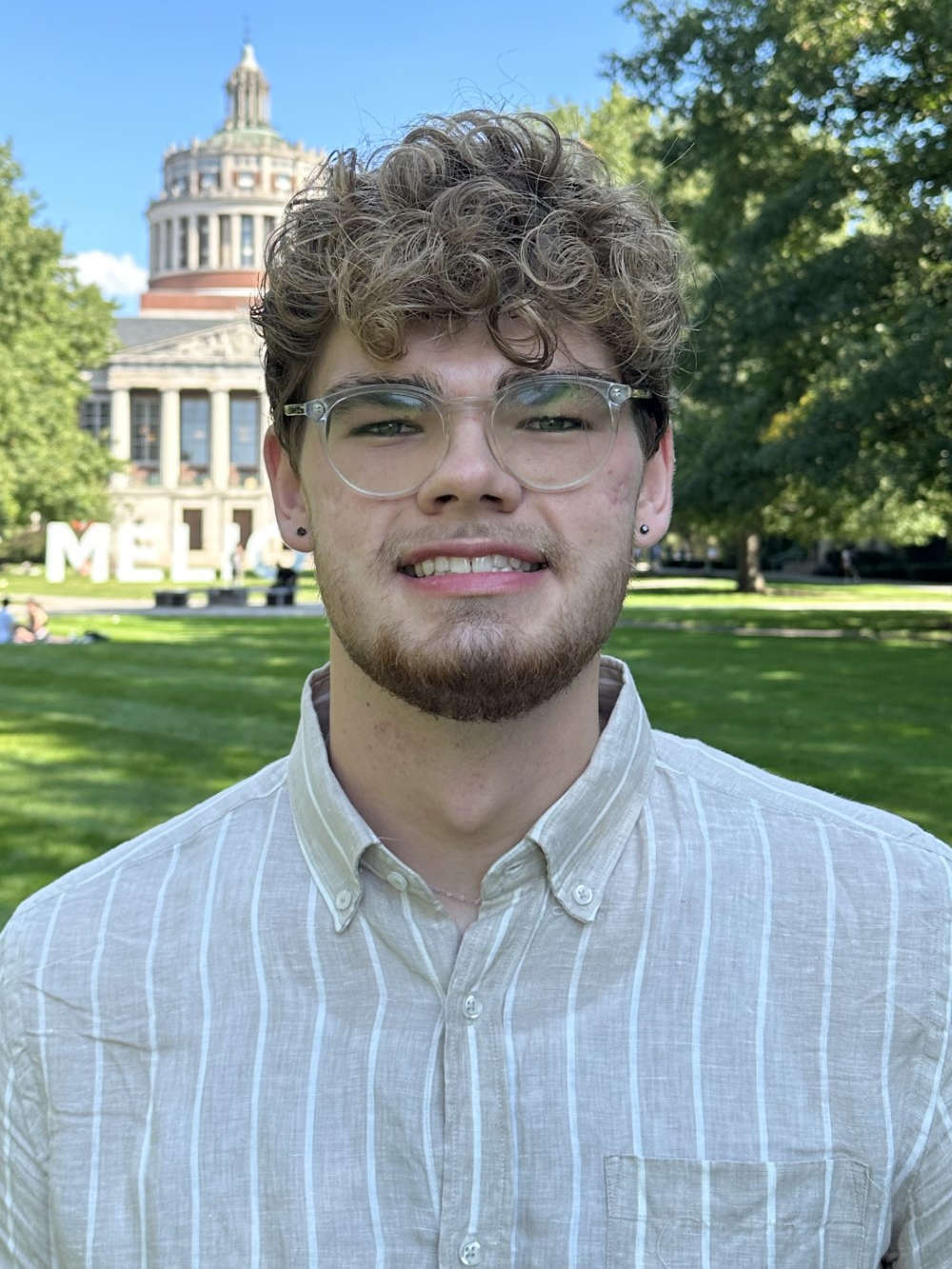 Riley Prewett with Rush Rhees Library in the background.