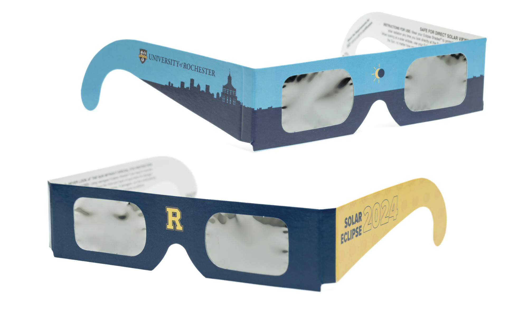 Two pairs of University of Rochester-branded solar eclipse glasses against a white background.