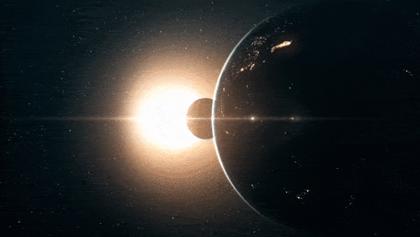 GIF of the moon moving between the Earth and the sun as it forms a solar corona during a total eclipse.