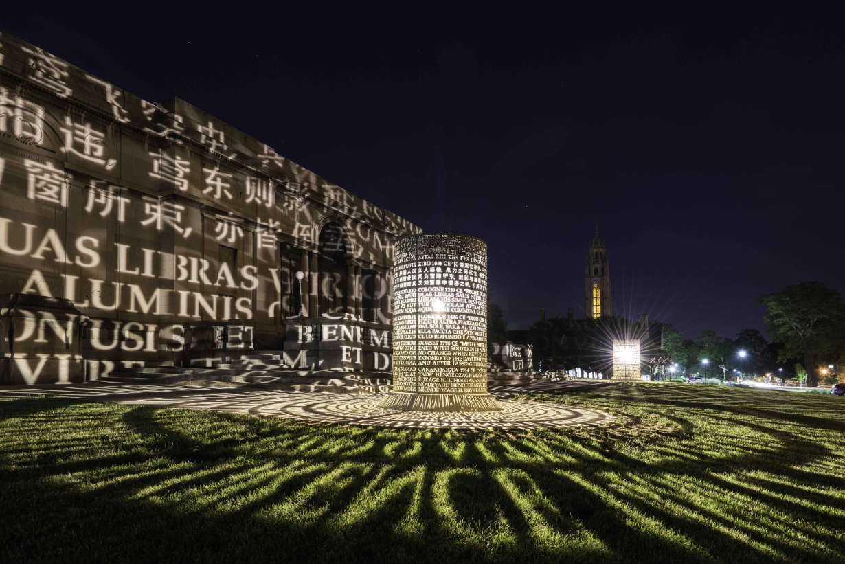 "Argentum" light sculpture lit up at night in on the Memorial Art Gallery lawn.