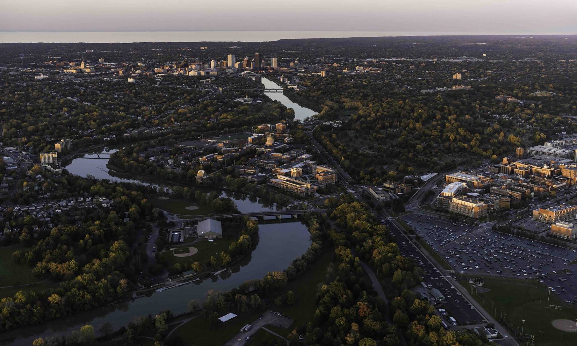 Aerial view of the University of Rochester campuses and nearby downtown Rochester during the 