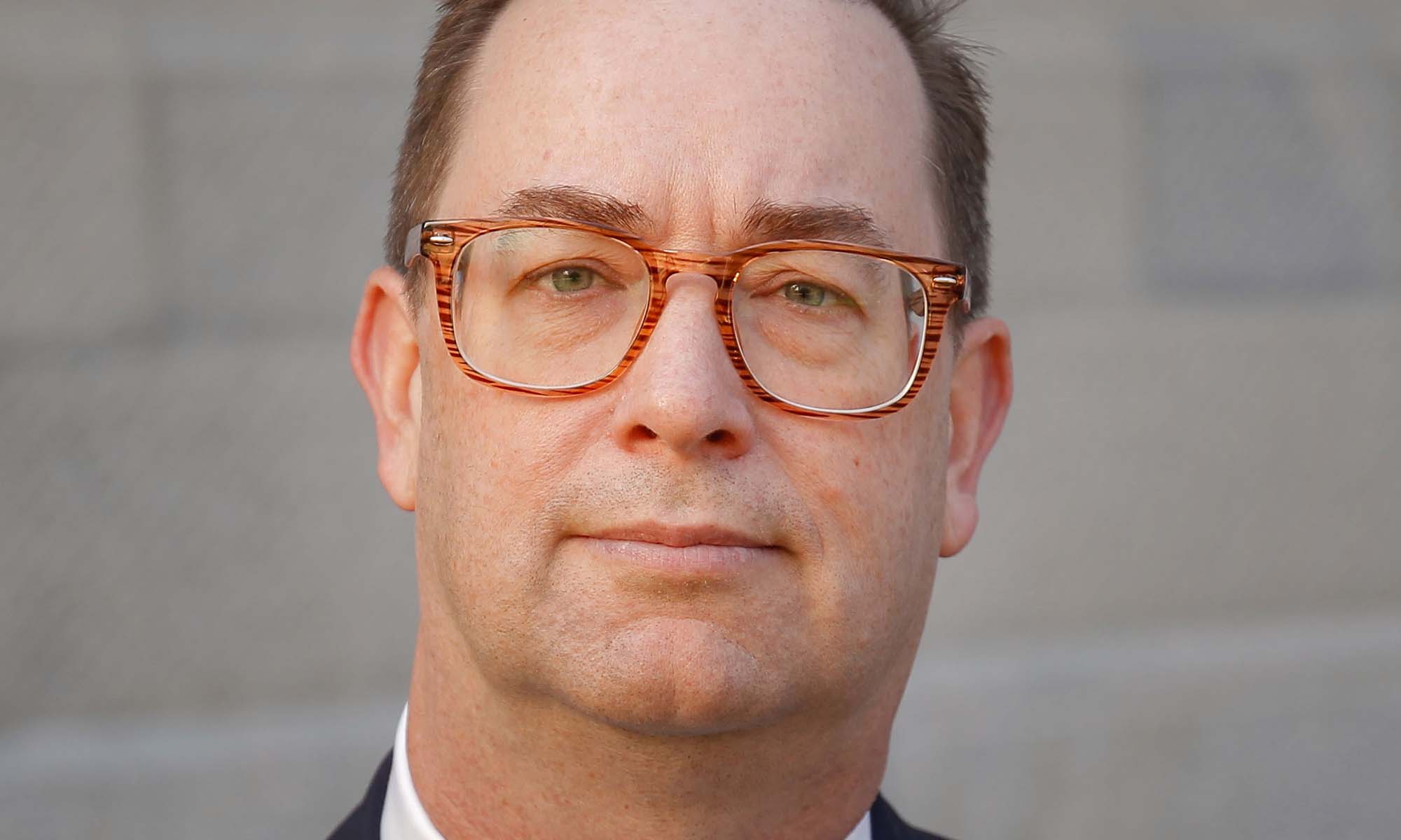 Close-up crop of a portrait of Geoffrey Berg.