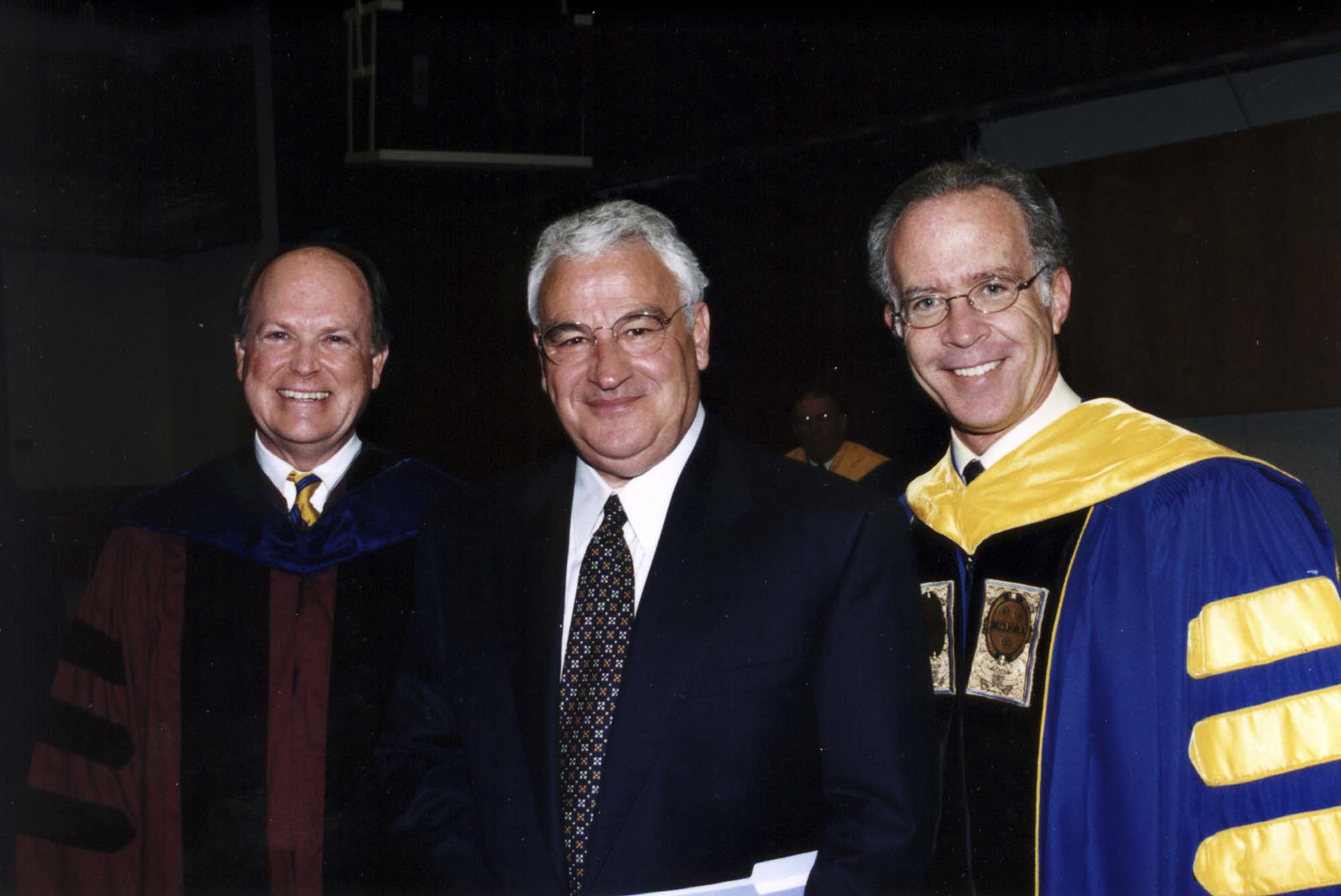 Charles Plosser, B. Thomas Golisano, and Thomas Jackson smile at the camera.