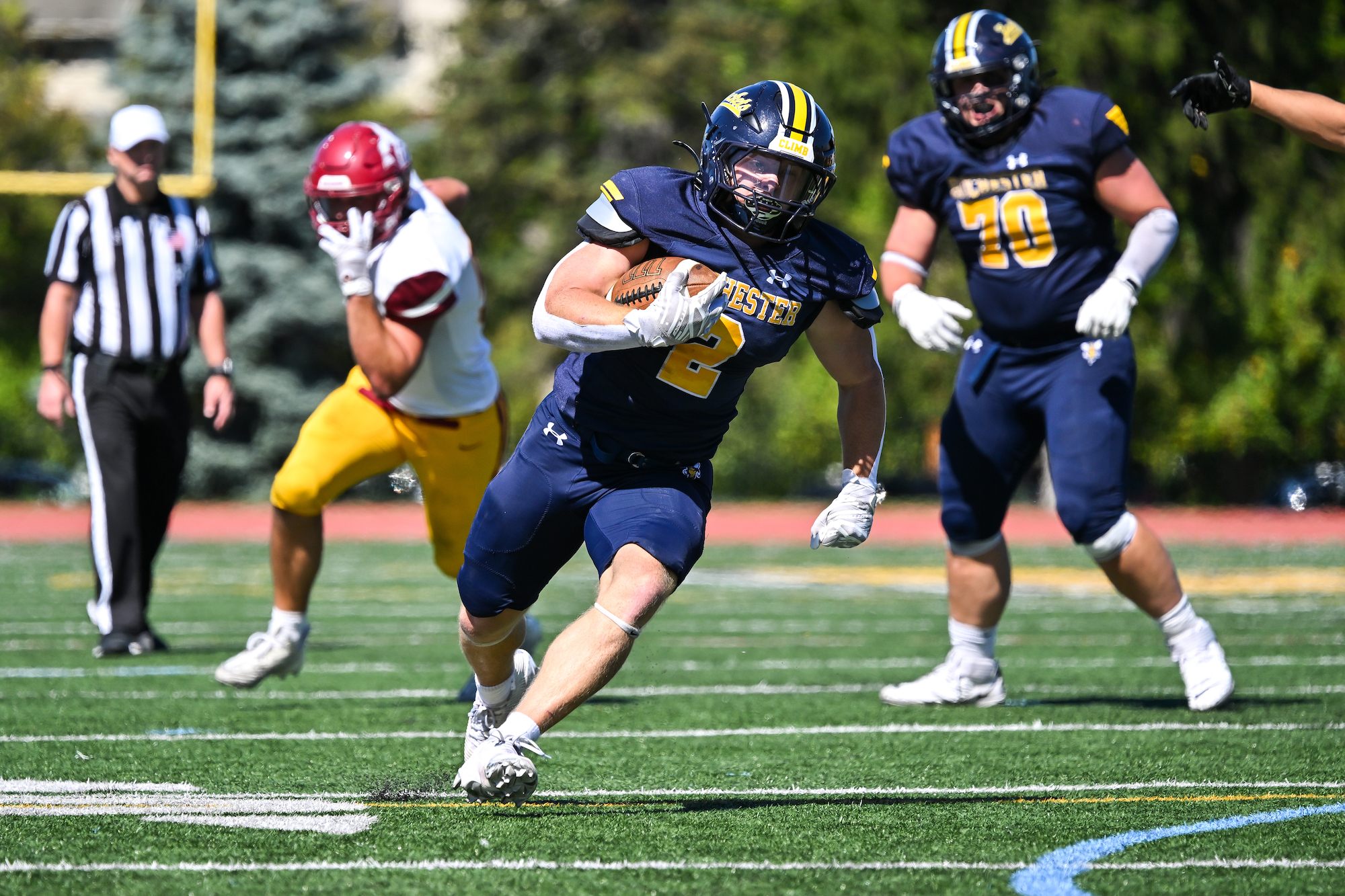 Yellowjackets football running back Cole Raux scores a touchdown. 