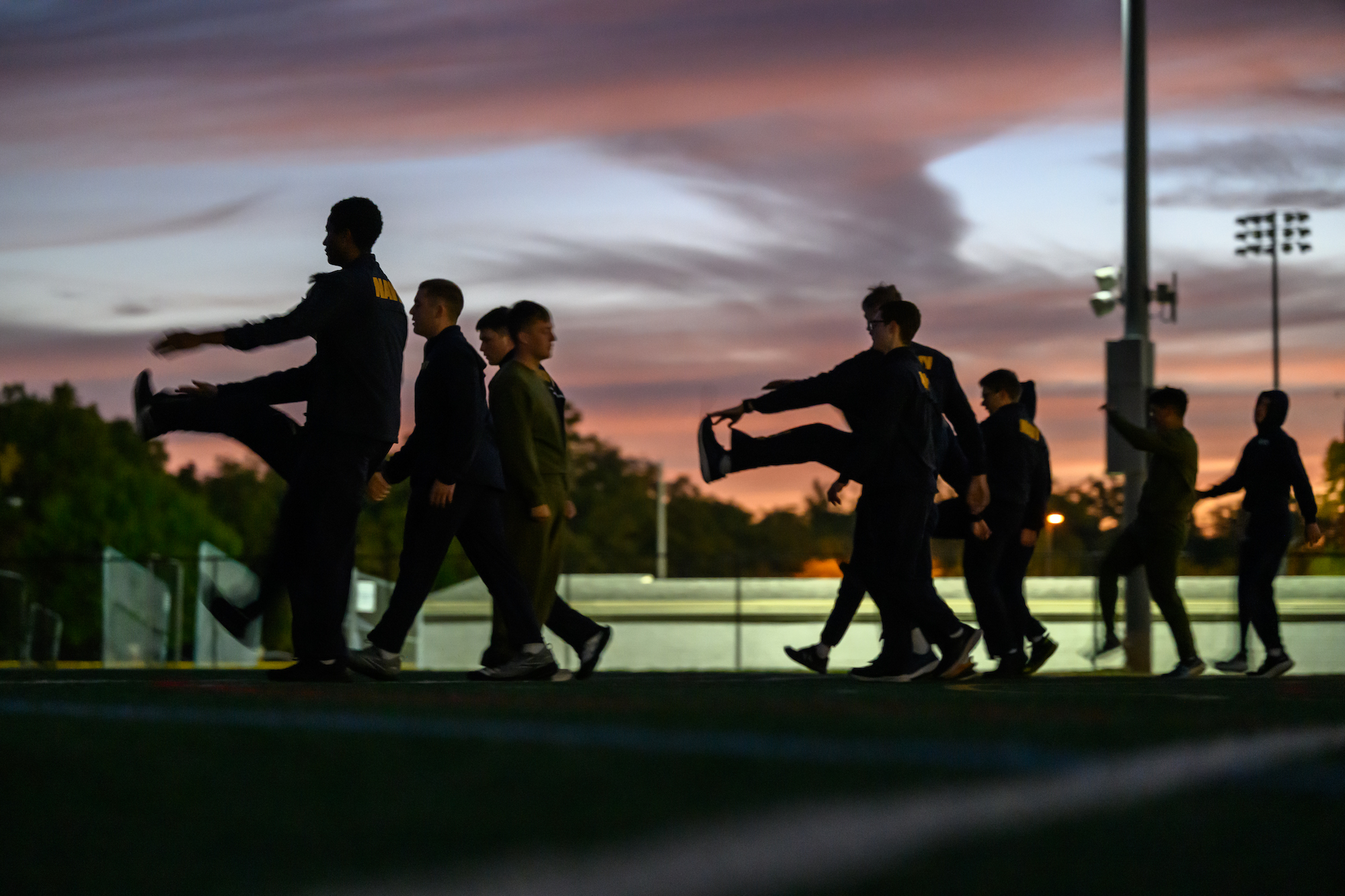 NROTC students are seen during morning battalion physical training.