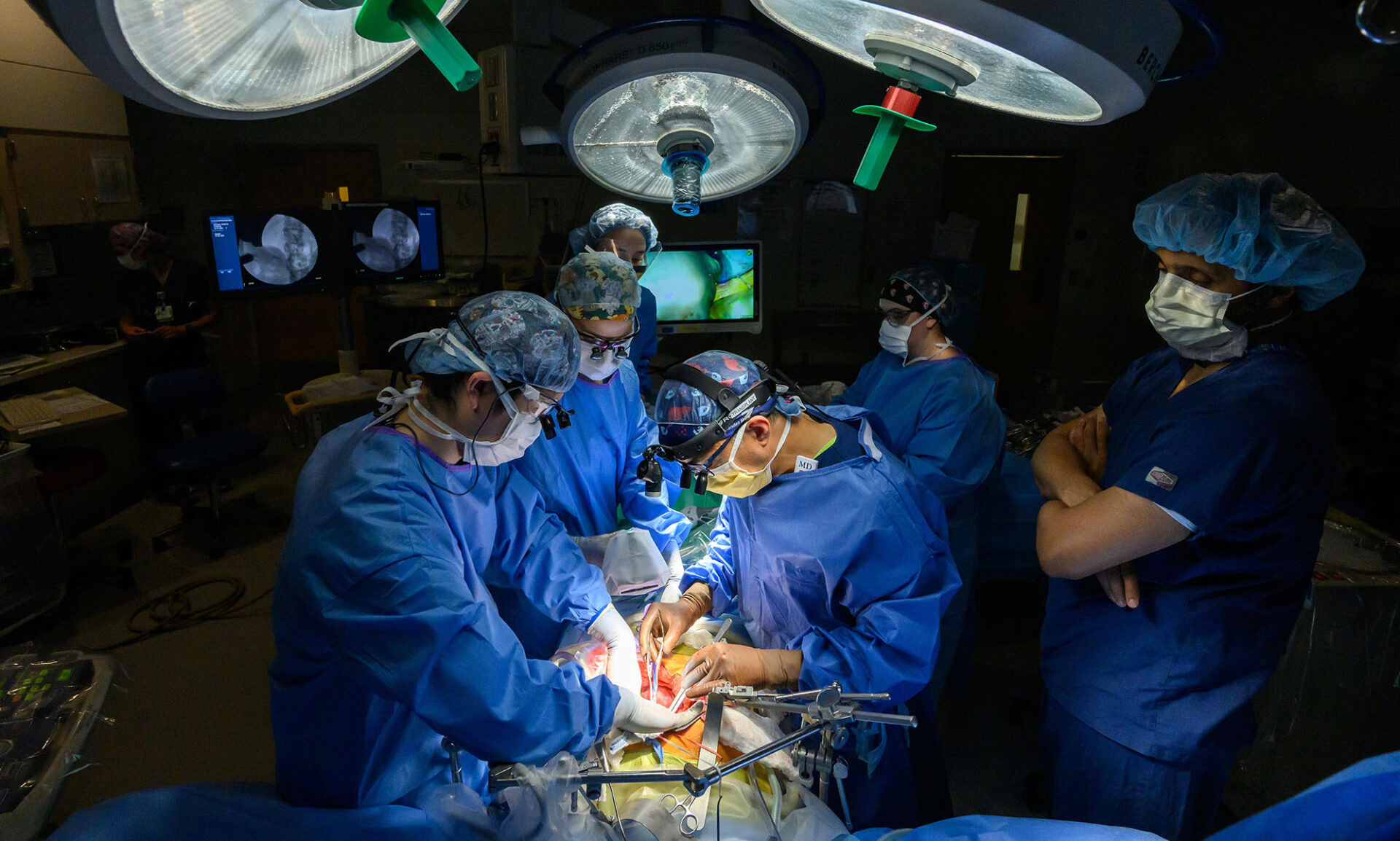 Dr. Roberto Hernandez-Alejandro and team perform a living donor liver transplant in an operating room.