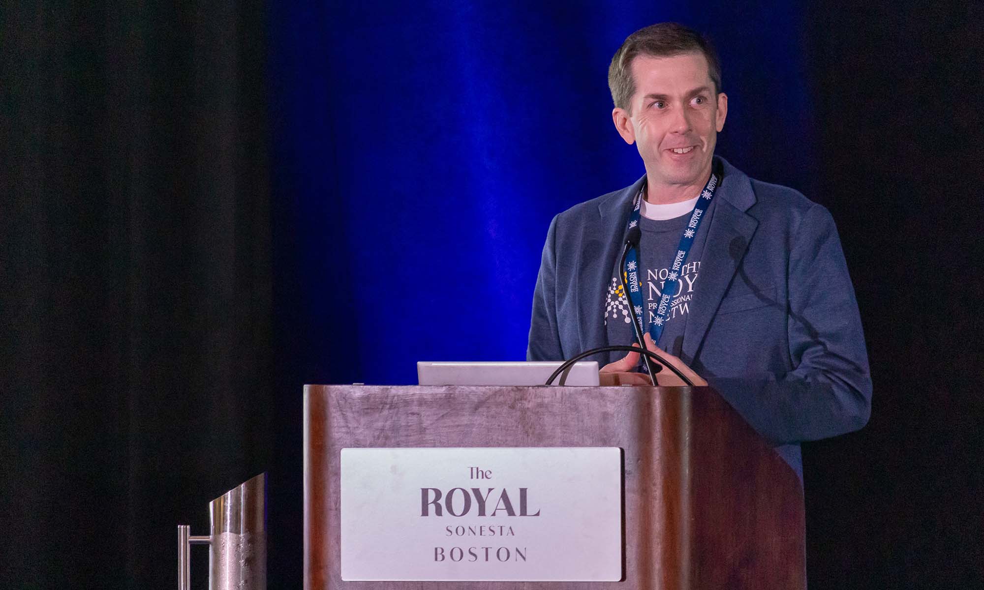 Michael Daley at a podium.