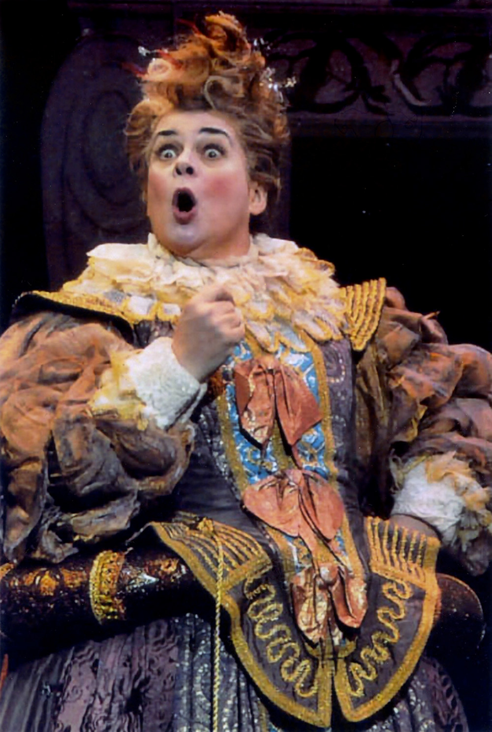 Kathryn Cowdrick singing opera in full costume.