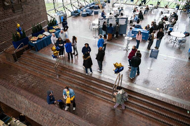 Overhead view of attendees at the 50th anniversary celebration for Wilson Commons.
