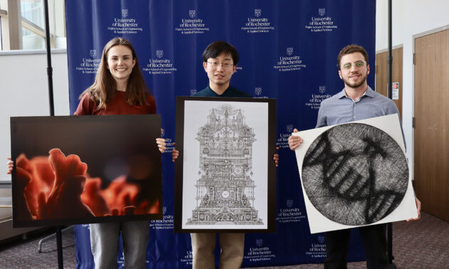 Meg Farinsky, Matthew Ahn, and Majd Tabsi hold up their award-winning pieces of art.
