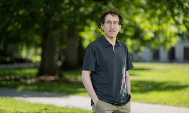 James Druckman standing with his hands in his pockets.