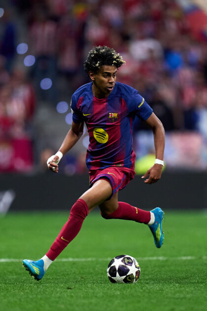 Action shot of Lamine Yamal of FC Barcelona on the pitch during a soccer match. 