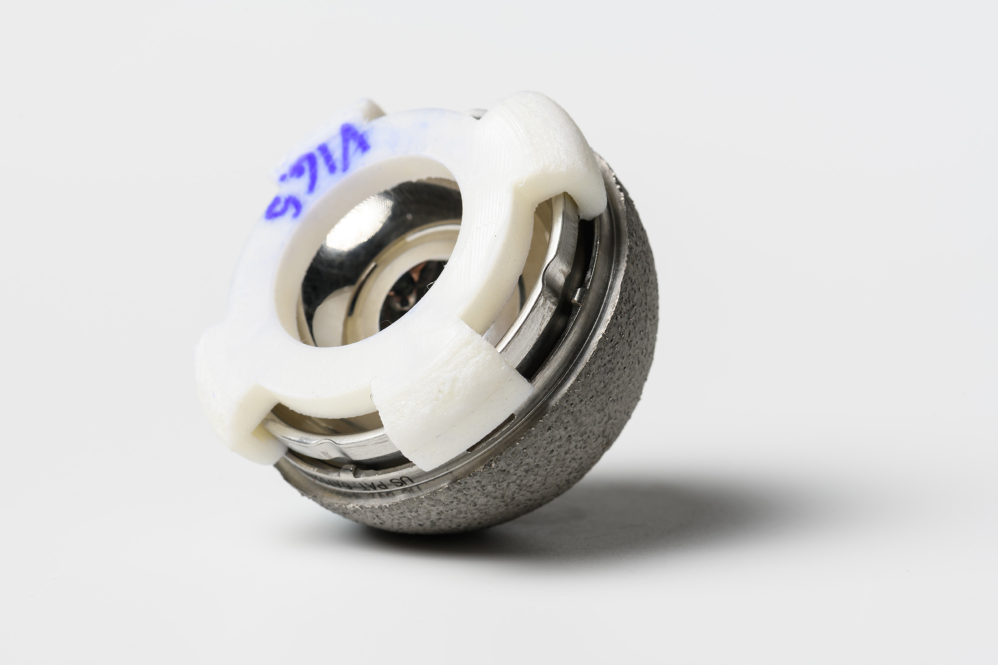 Close-up of Align-a-Liner device from Guidus Medical.