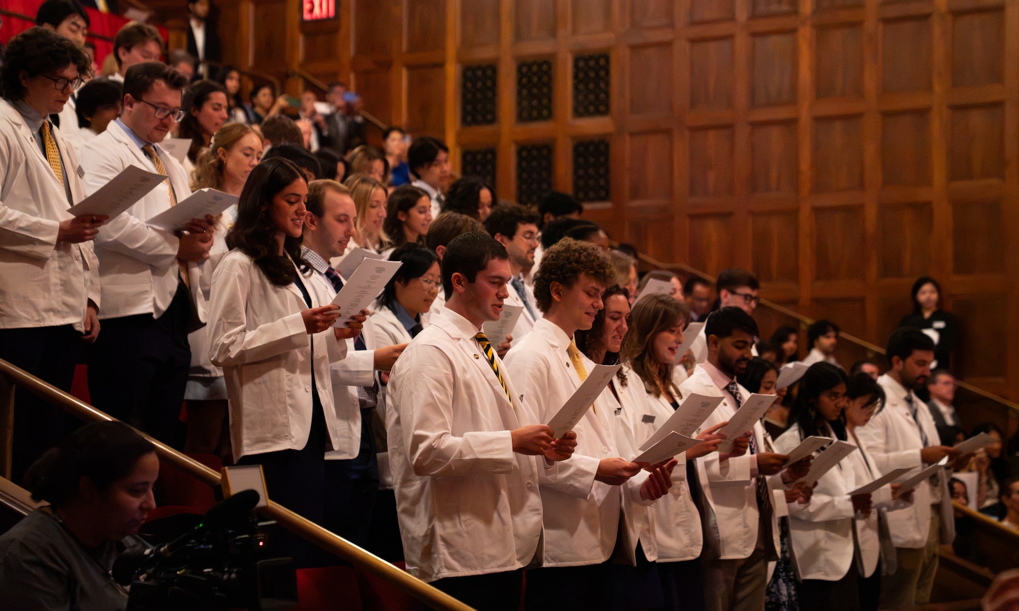 Members of the Class of 2030 recite the oath during the White Coat Ceremony.