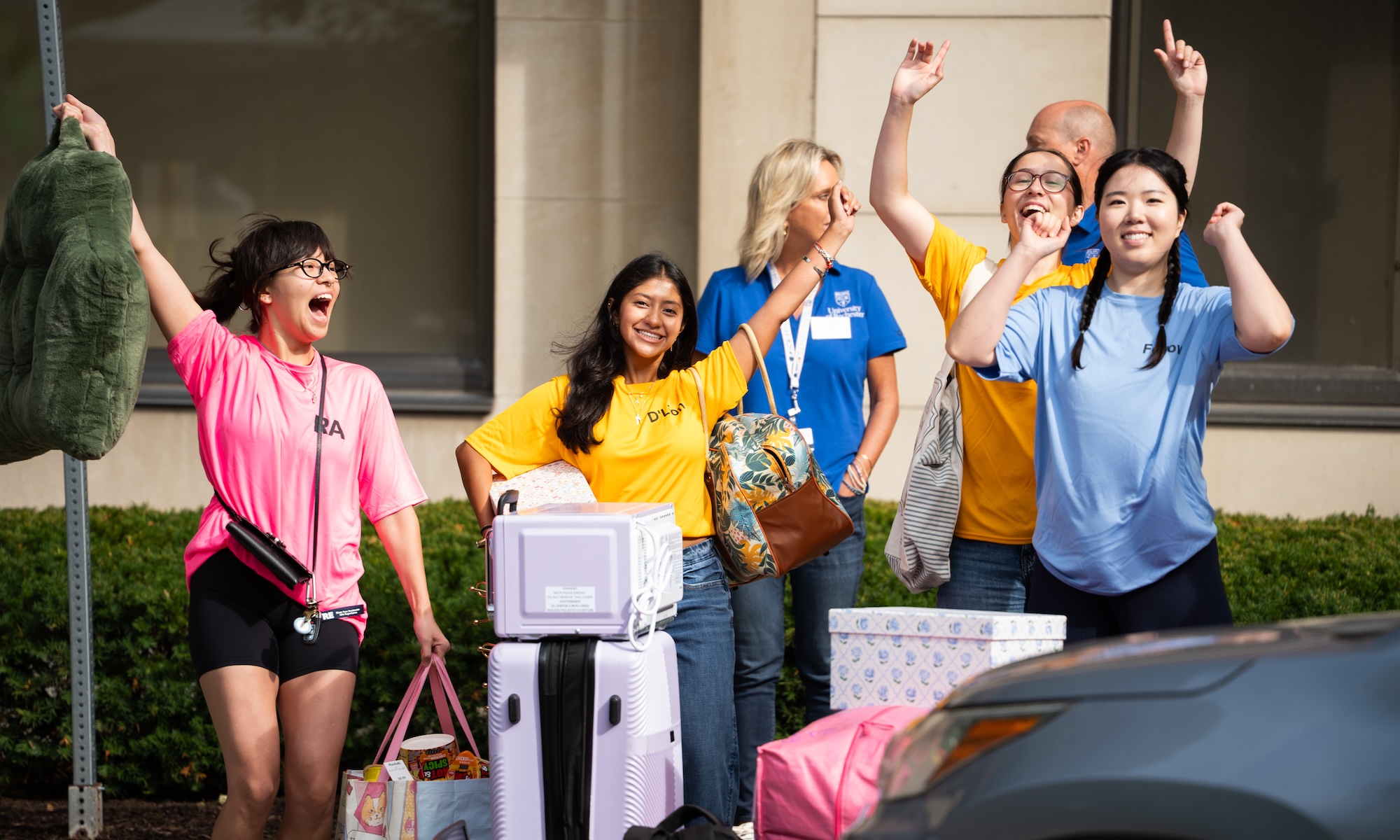 University of Rochester D’Lions, resident advisors, and first-year fellows cheer and welcome incoming students as they arrive for Move-In Day 2026.