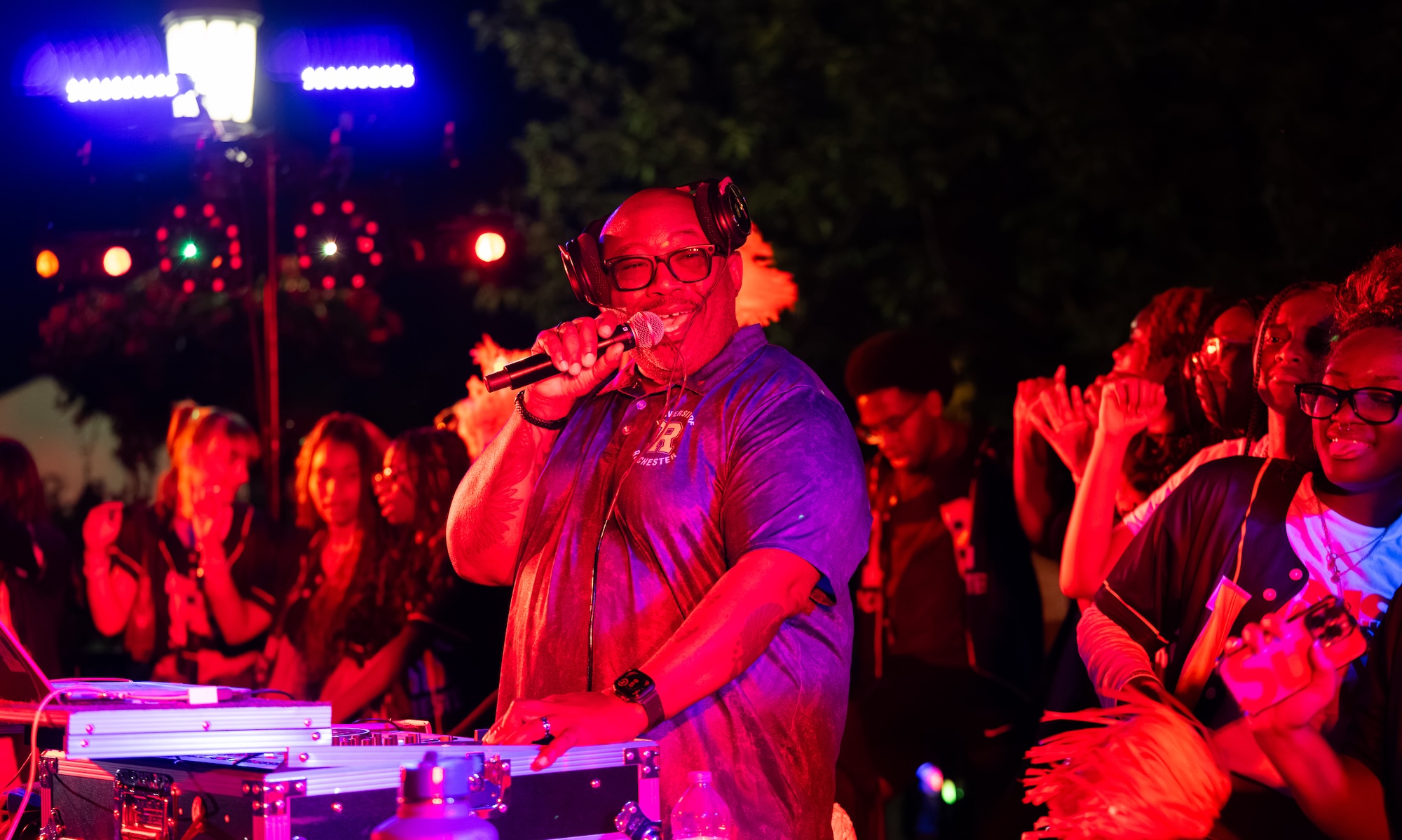John Blackshear, vice president for student life, DJs during the candlelight ceremony.