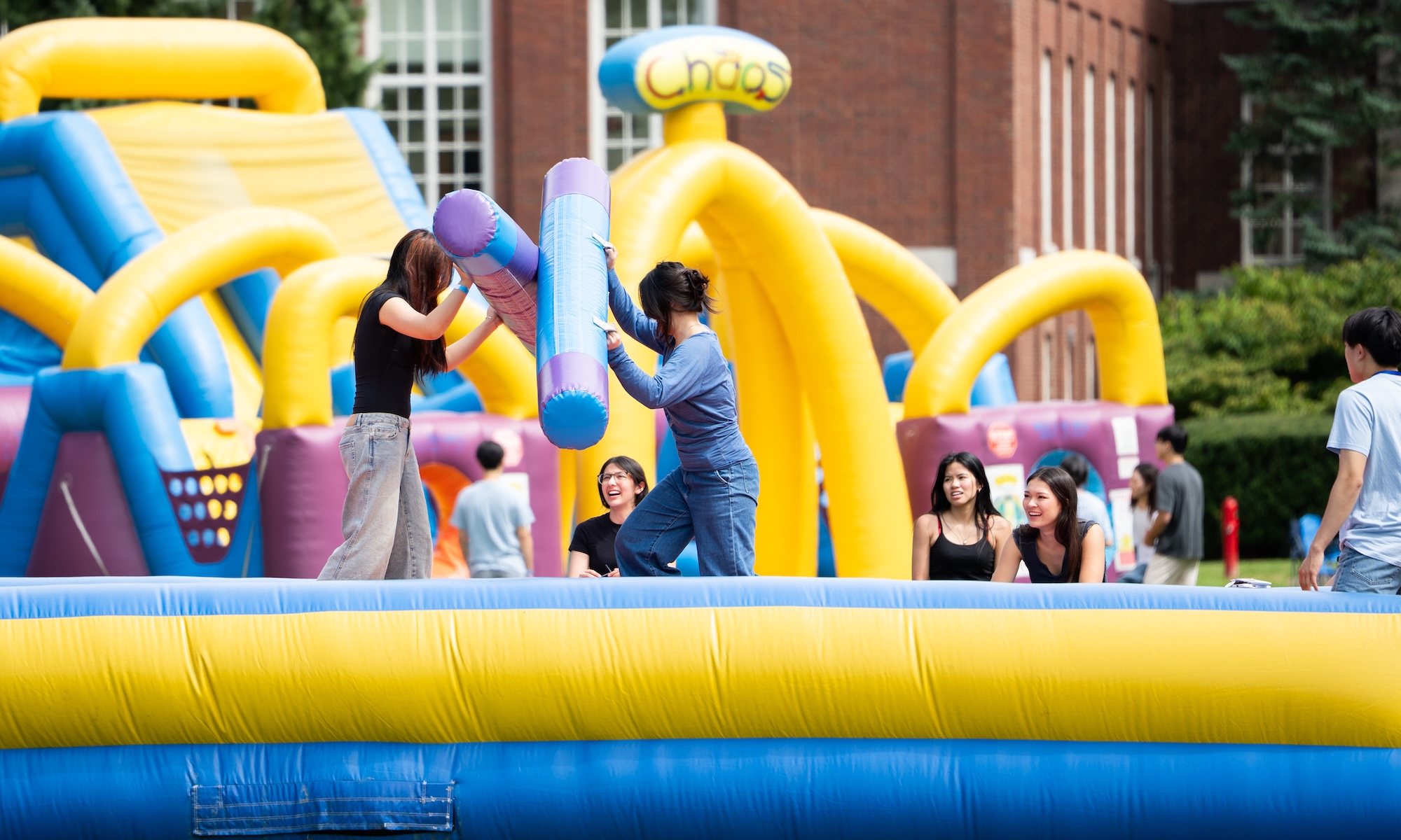 Students take part in games, inflatable activities, and outdoor recreation during Field Day.