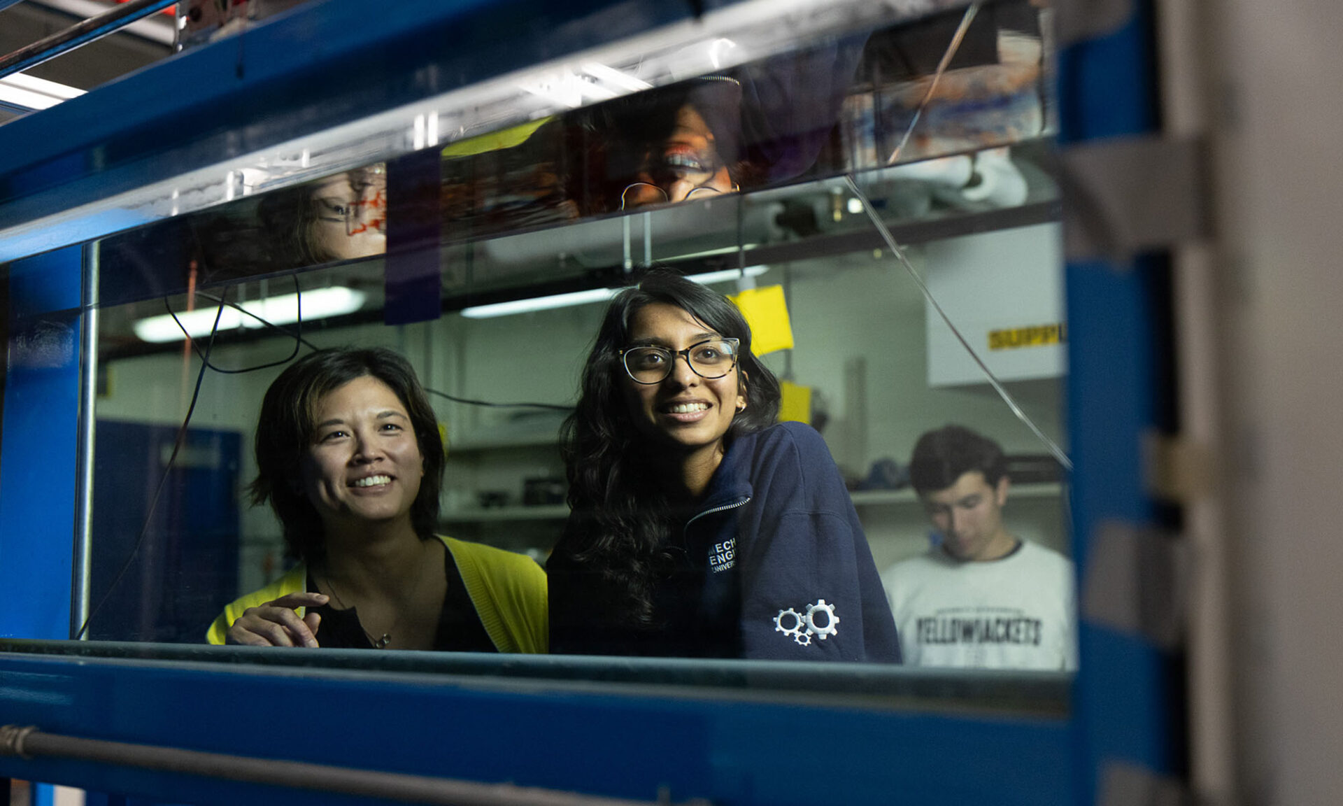 Jessical Shang (left) with two students in her mechanical engineering lab.