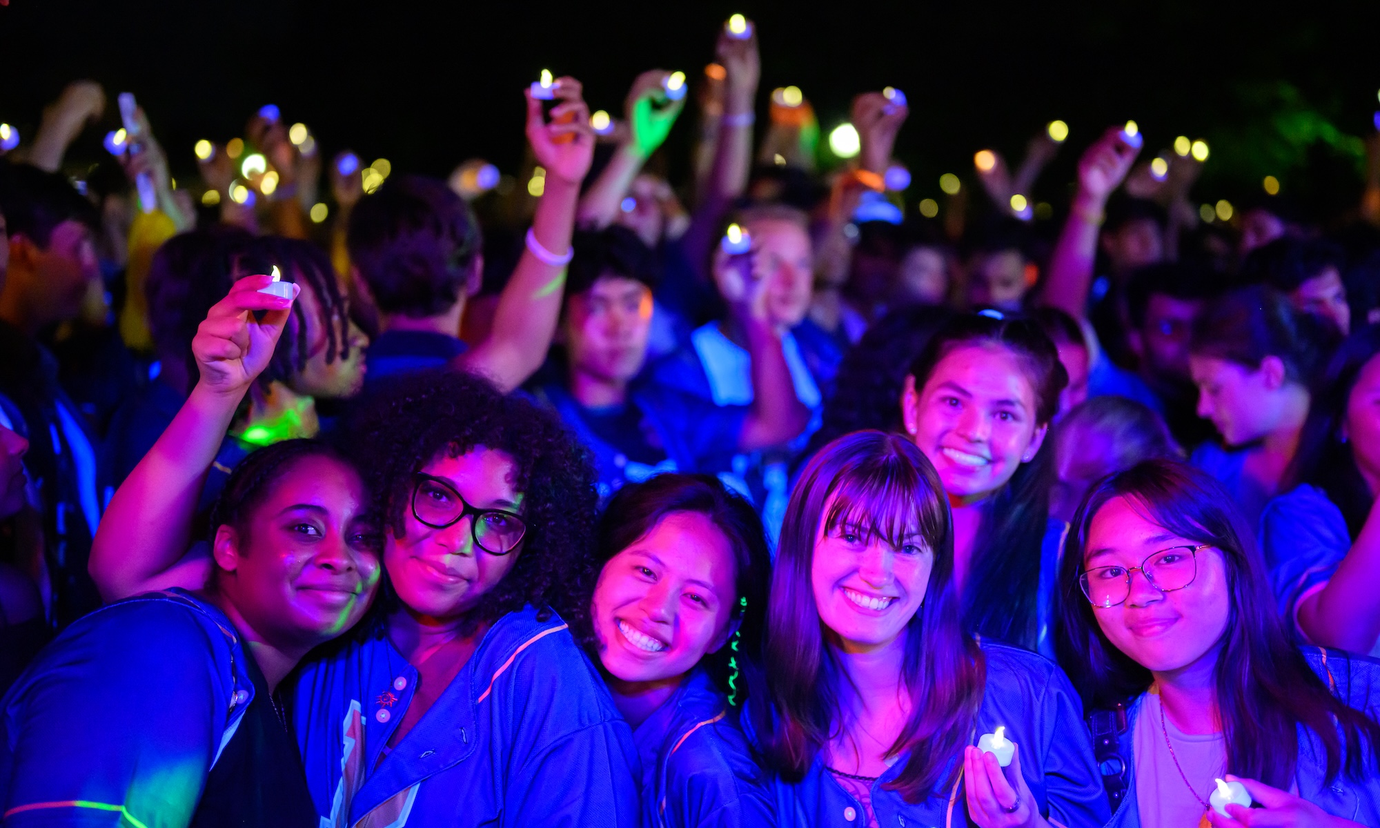 Students attend the Candlelight ceremony during Welcome Week.