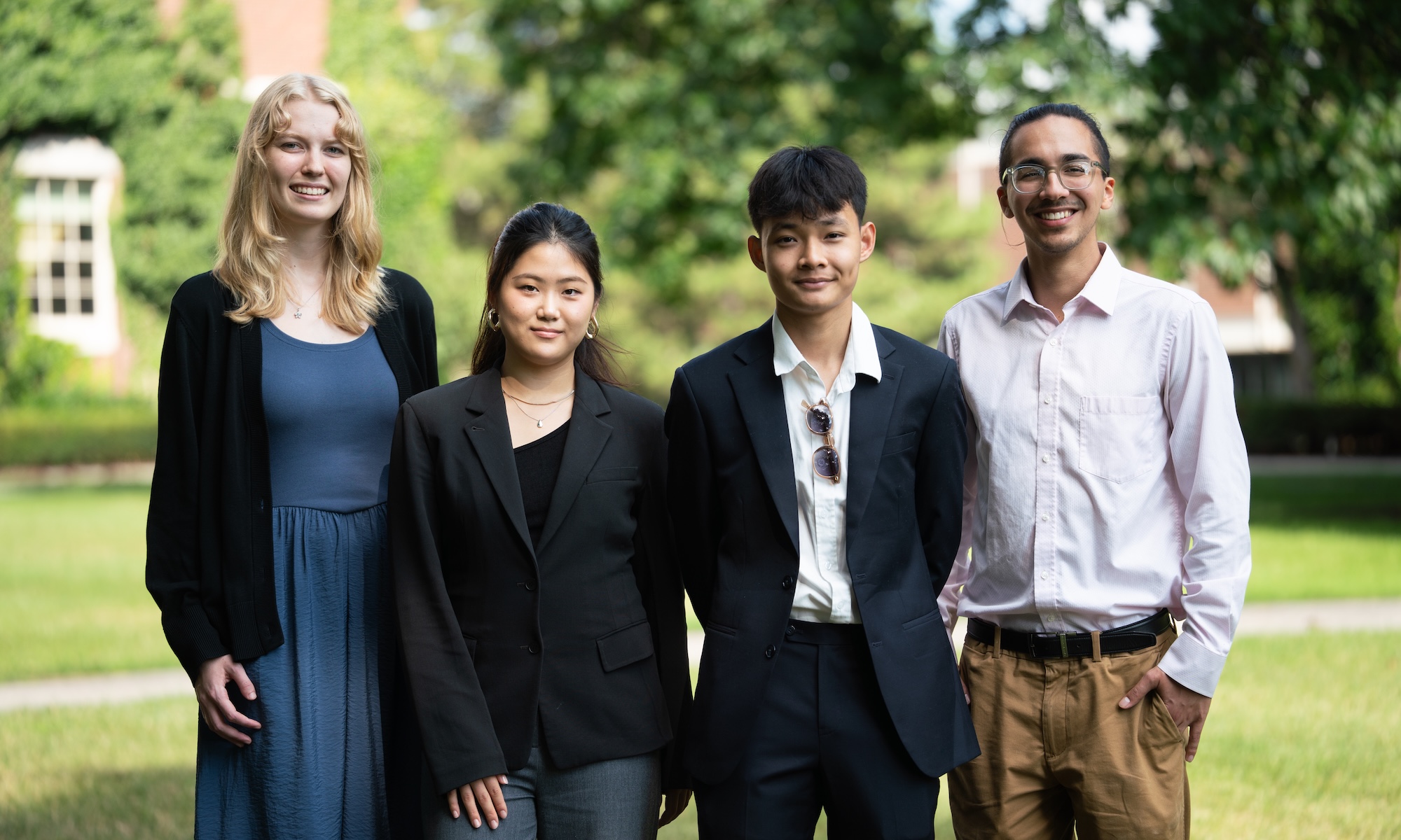 Hire Rochester interns Alayna Leestma, Claire Cho, Triet Ly, and Ivan Cea Gomez on the URochester quad.