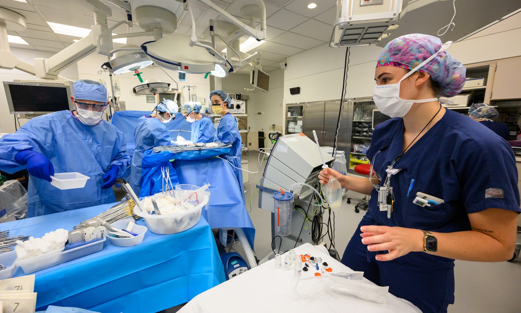 Jacob Williams and circulating nurse Teagan Cronk. during a live-donor liver transplant surgery.