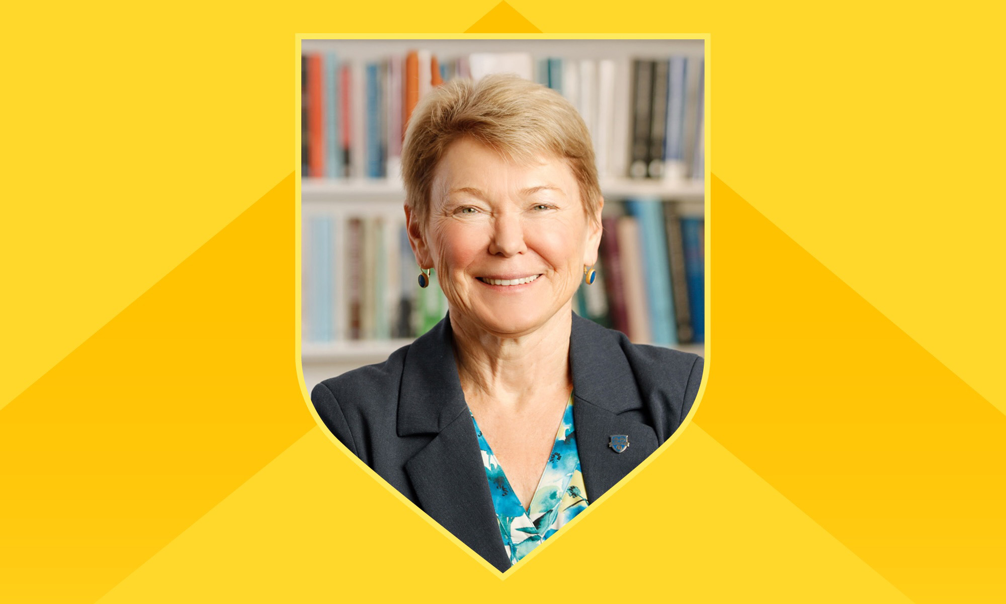 Portrait of Sarah Mangelsdorf within a shield outline against a yellow background with a darker yellow chevron on it.