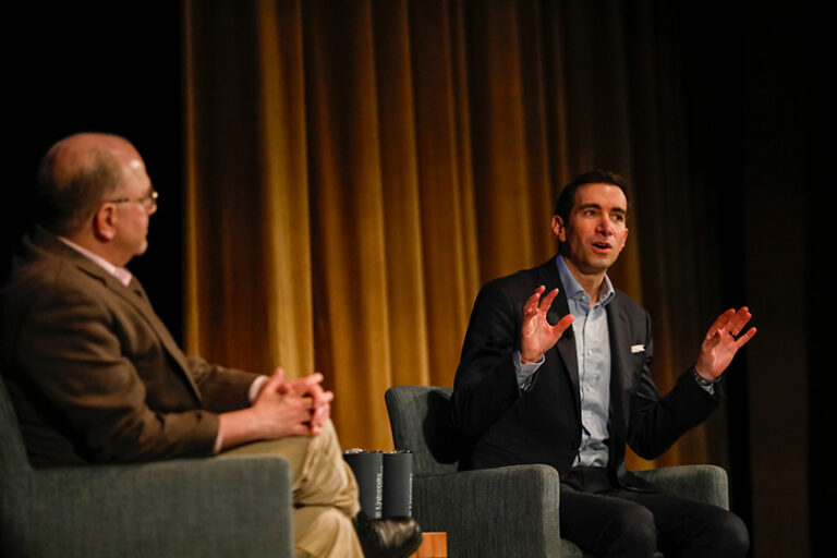 Andrew Ross Sorkin seated during a moderated conversation on stage at Meliora Weekend 2026.