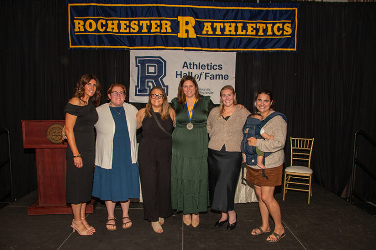 URochester alumnae gather for a group portrait at the URochester Athletics Hall of Fame event.