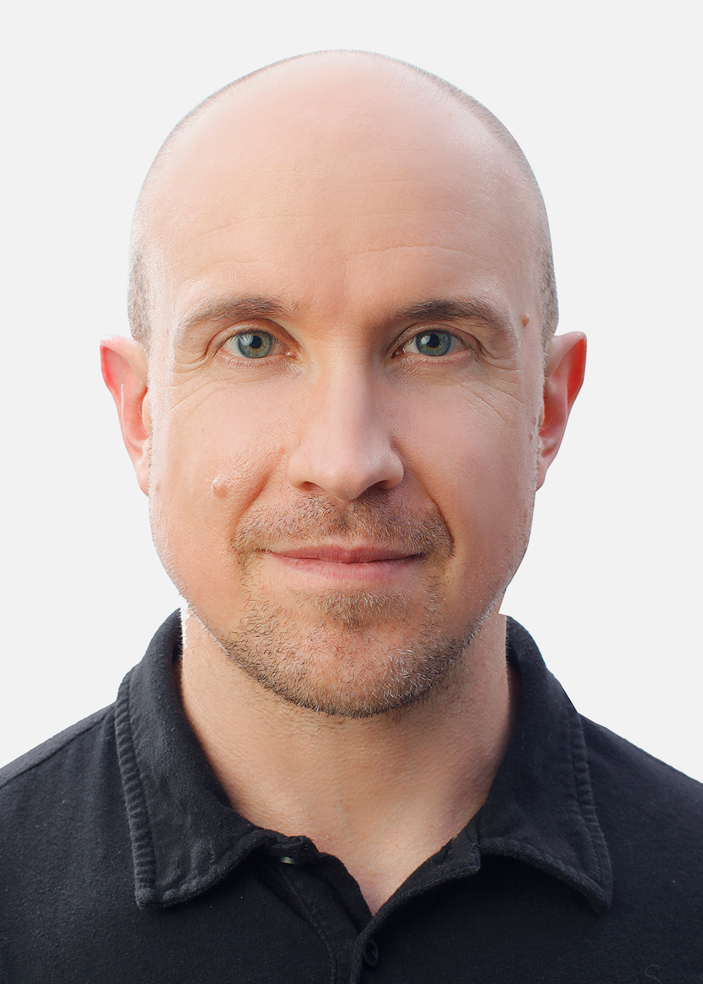 Thomas Weber wears a dark gray shirt and looks toward the camera against a white background.
