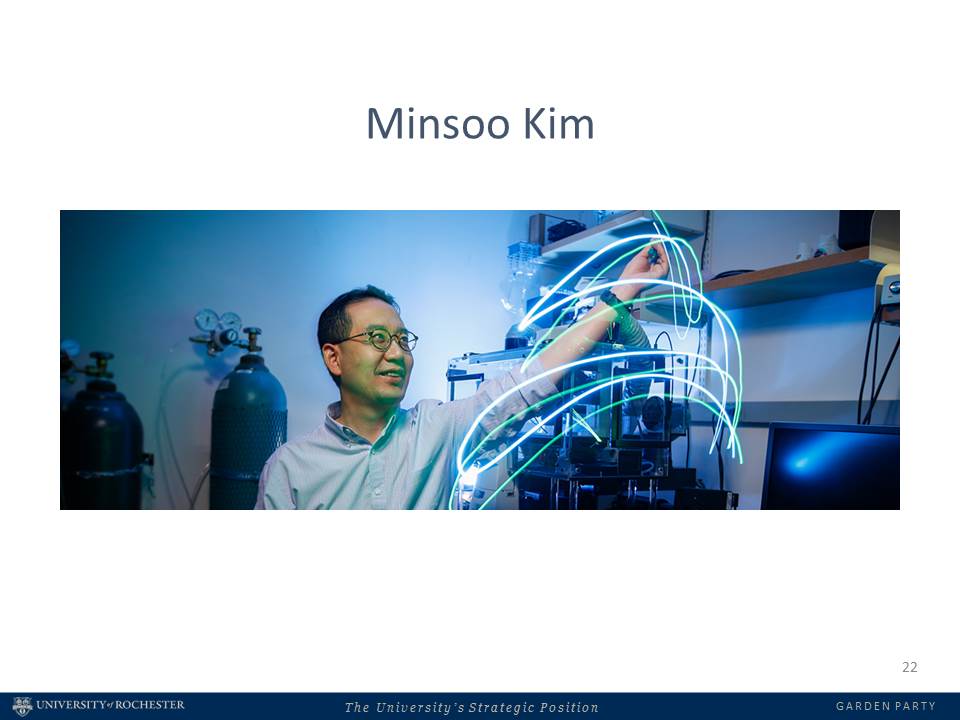 professor with equipment amid a swirl of light
