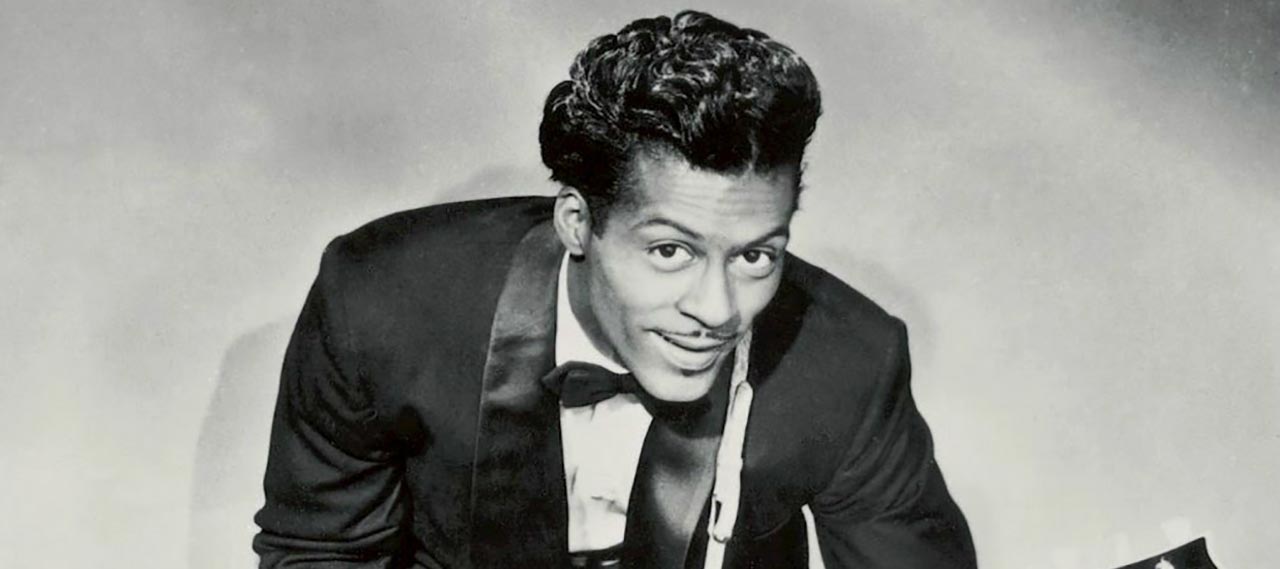 Chuck Berry playing guitar.