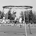 photo of members of Athletics and Recreation teaching a sports camp