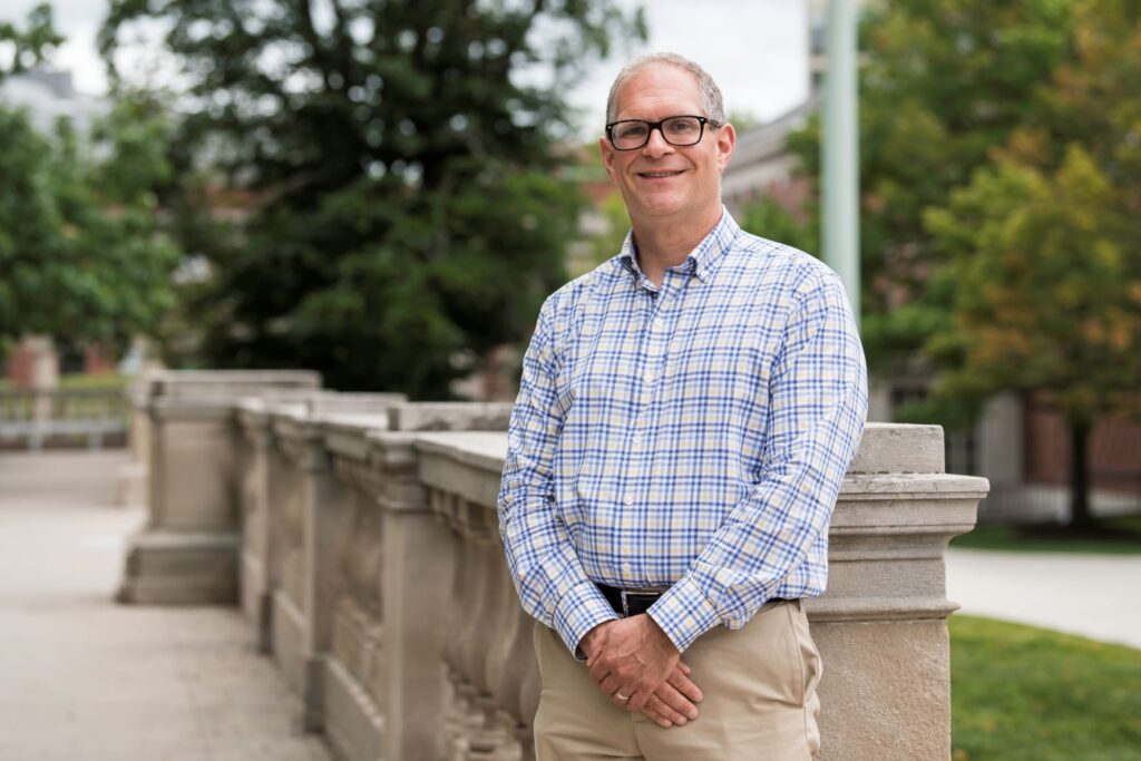 University of Rochester provost David Figlio standing outside on the University's campus