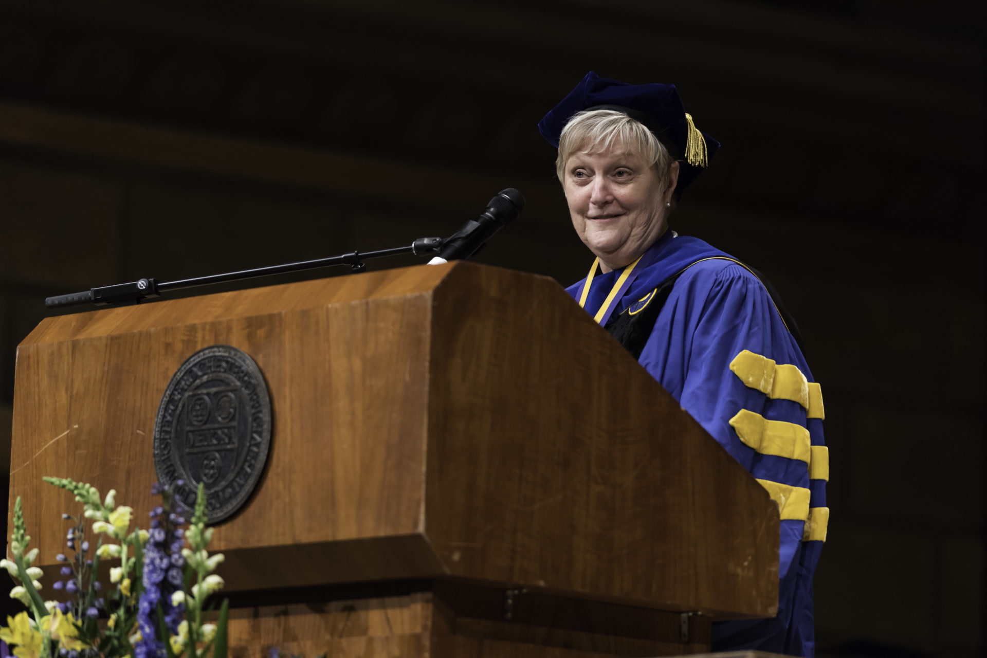 Donna Brink Fox, making remarks at the University of Rochester commencement