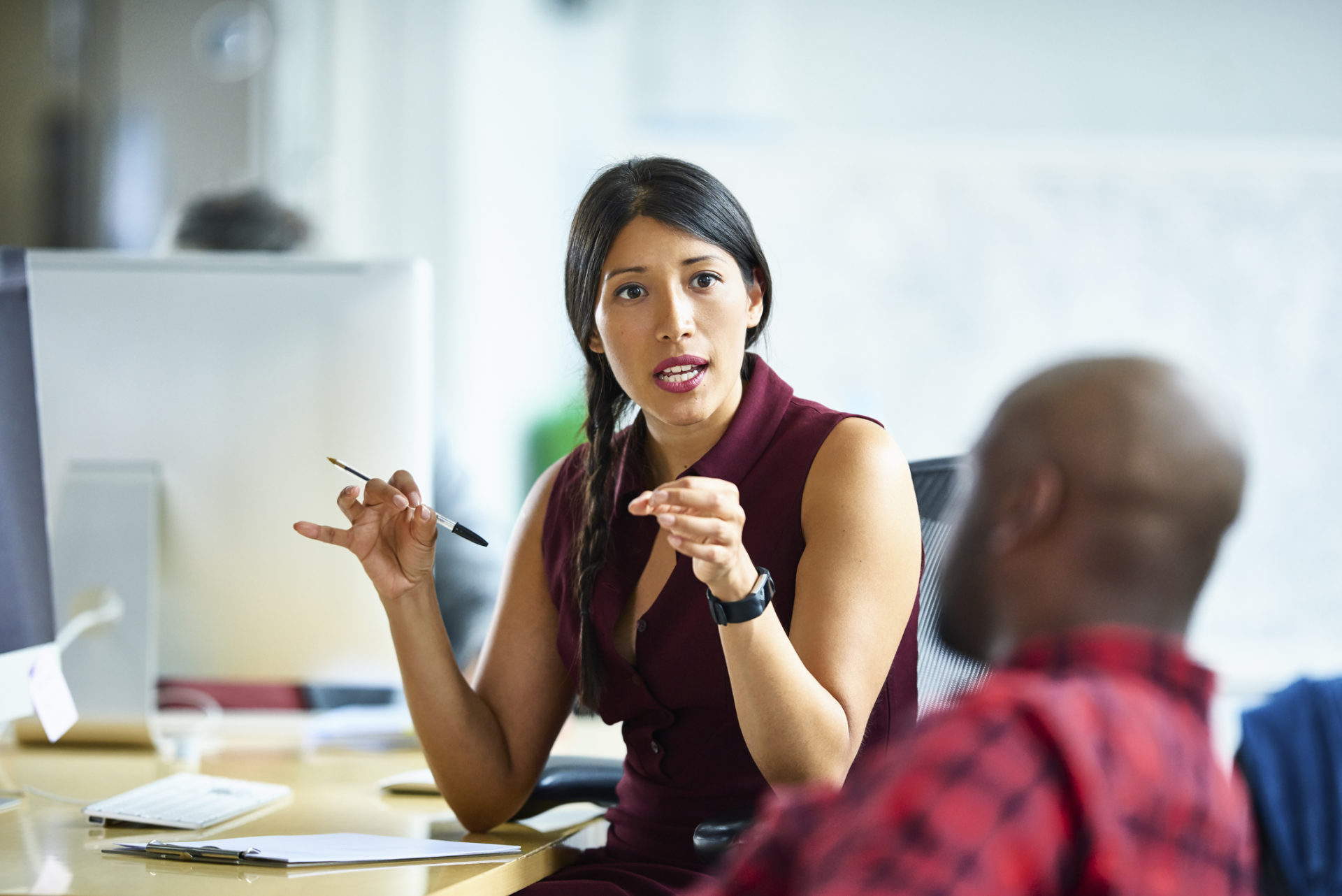 Man and woman talking in modern office