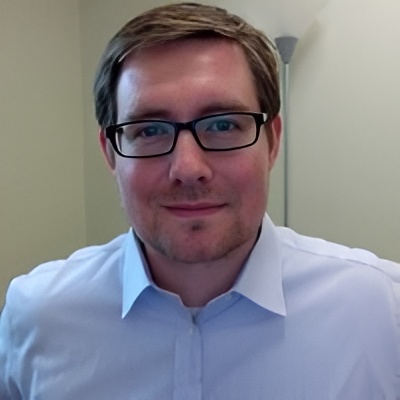 Headshot of Nicholas Hammond.