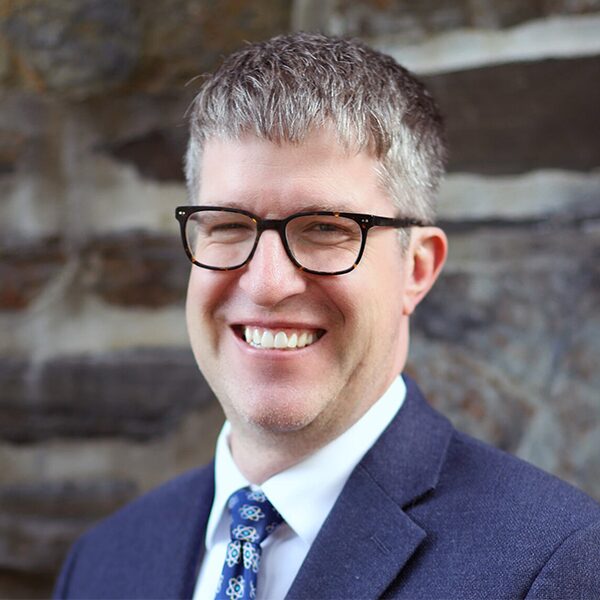 Dean Sam Thomas headshot