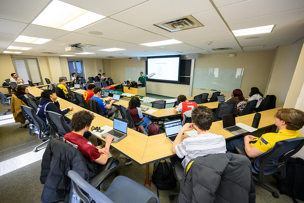 A classroom viewed from the back of the room.
