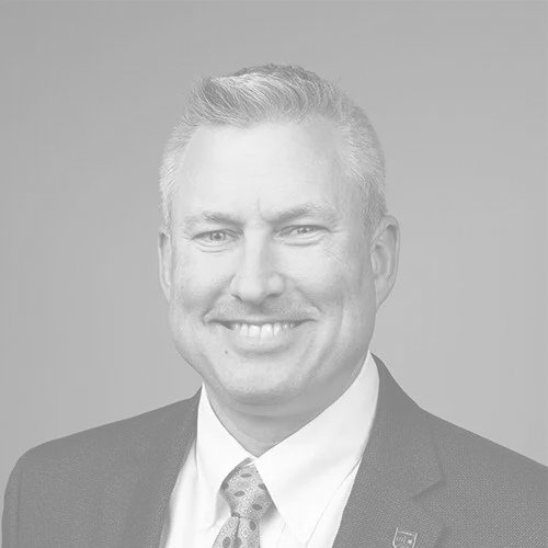 Tim's headshot in black and white.