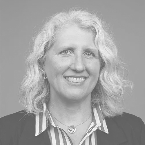 Nicole's headshot in black and white.