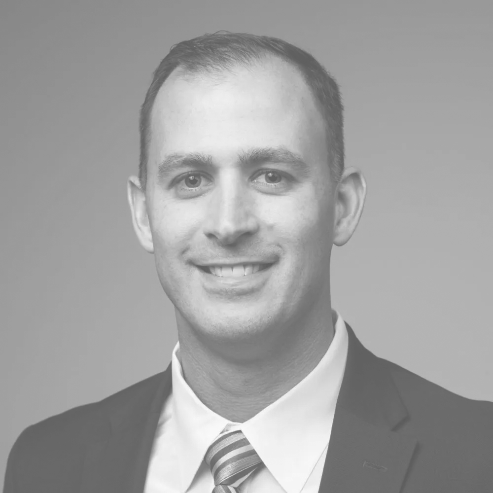 Tony's headshot in black and white.