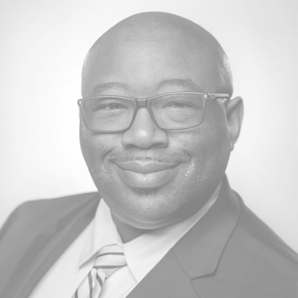 John's headshot in black and white.