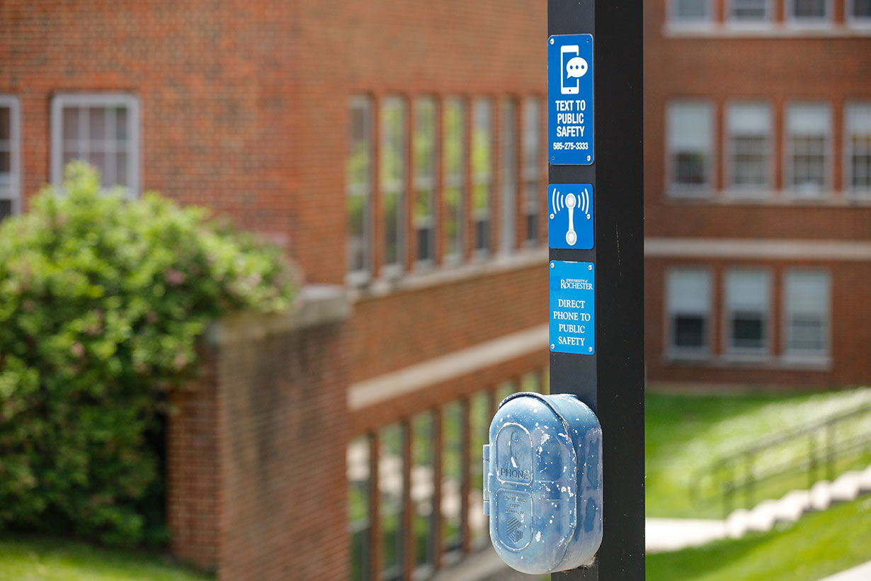 Close up of a Blue Light phone on the University of Rochester's River Campus.