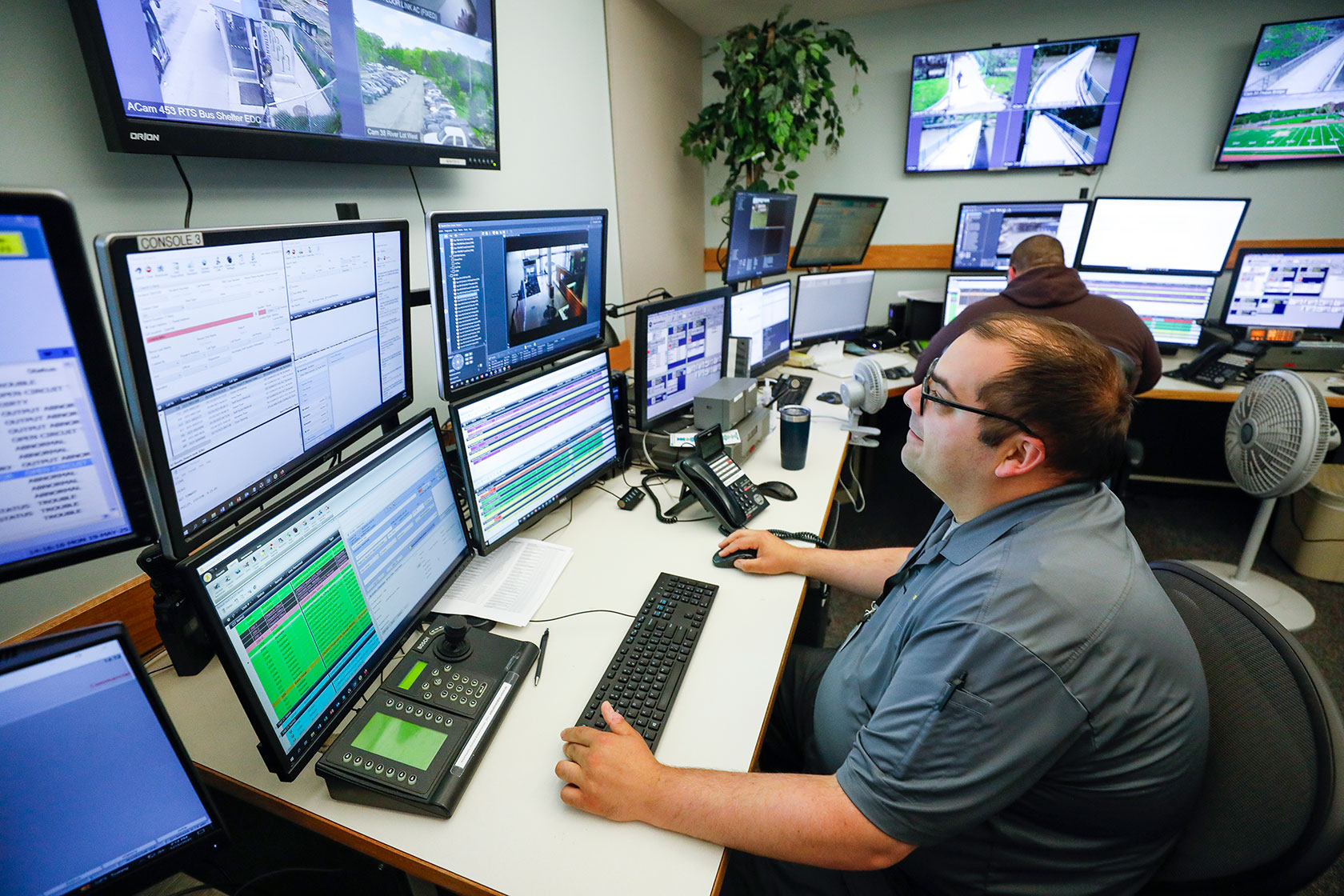 A University of Rochester DPS employee works in the department's Communication Center.