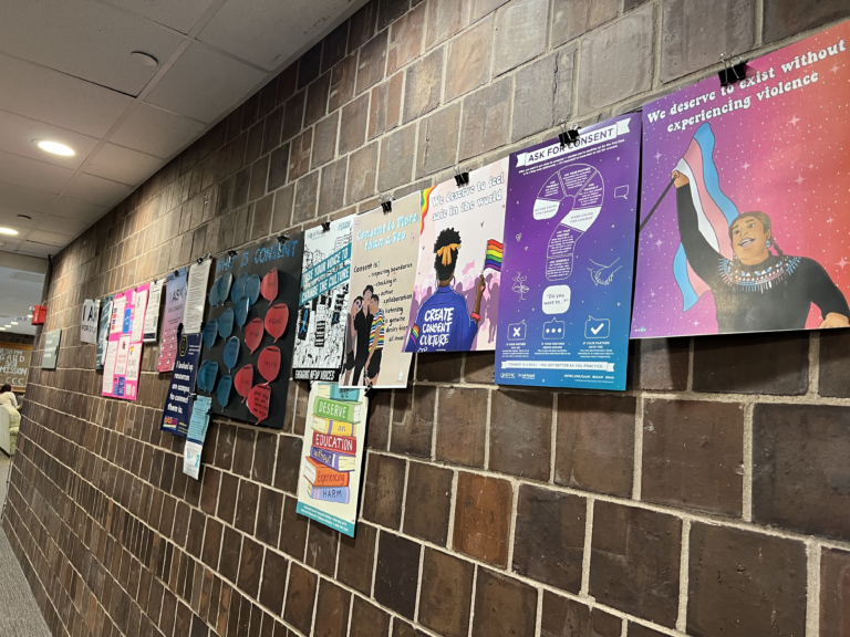 A photo of the Wilson Commons Expression Wall full of consent posters for folks to read as they walked by in April which is Sexual Assault Awareness Month.
