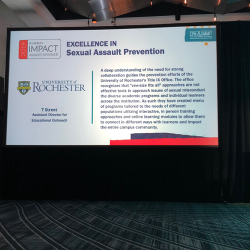 an image of a power point slide showing the University of Rochester Title IX Office as an award winner for sexual assault prevention.