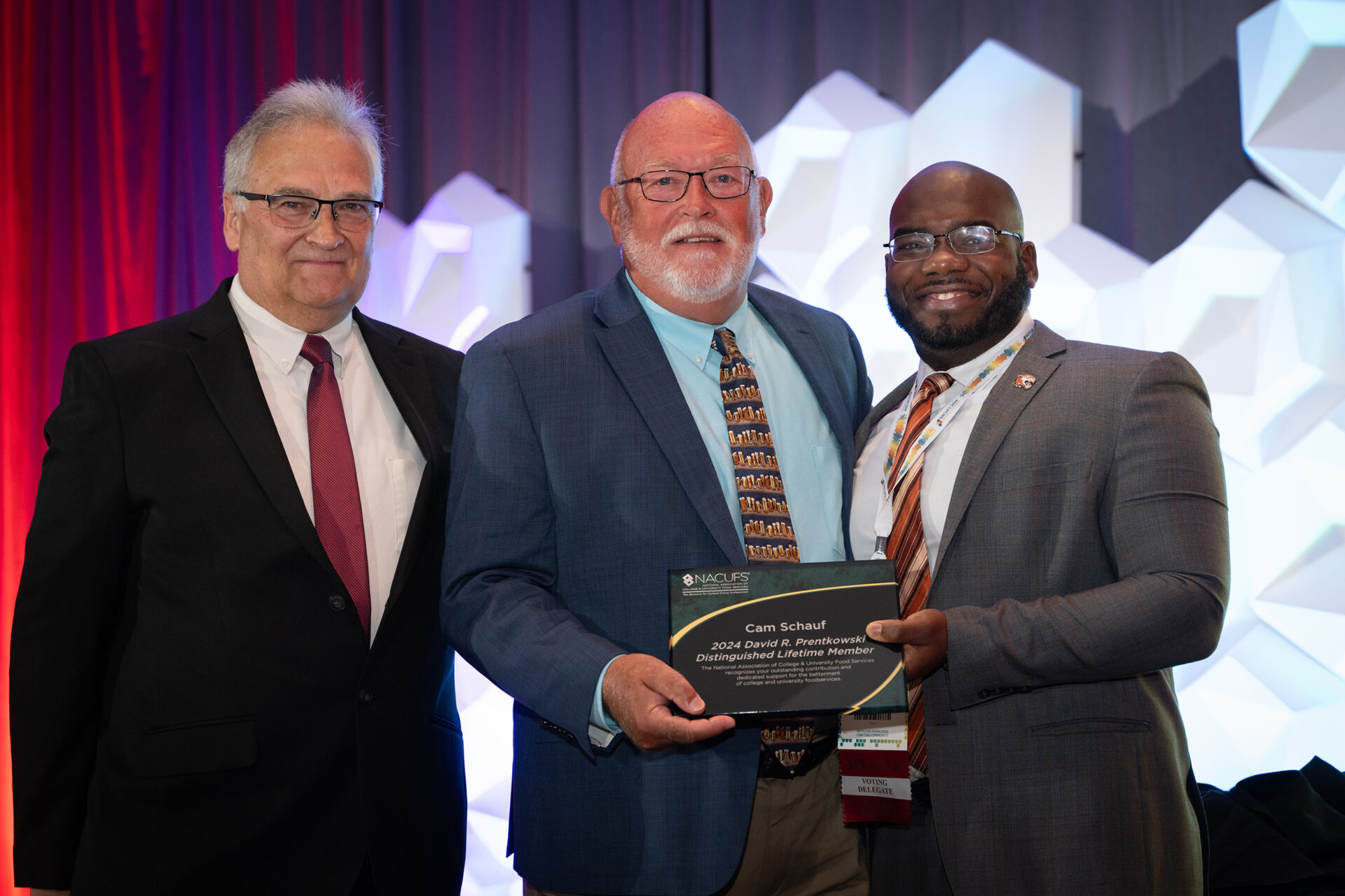 Cam Schauf receiving the David R. Prentkowski Distinguished Lifetime Member Award