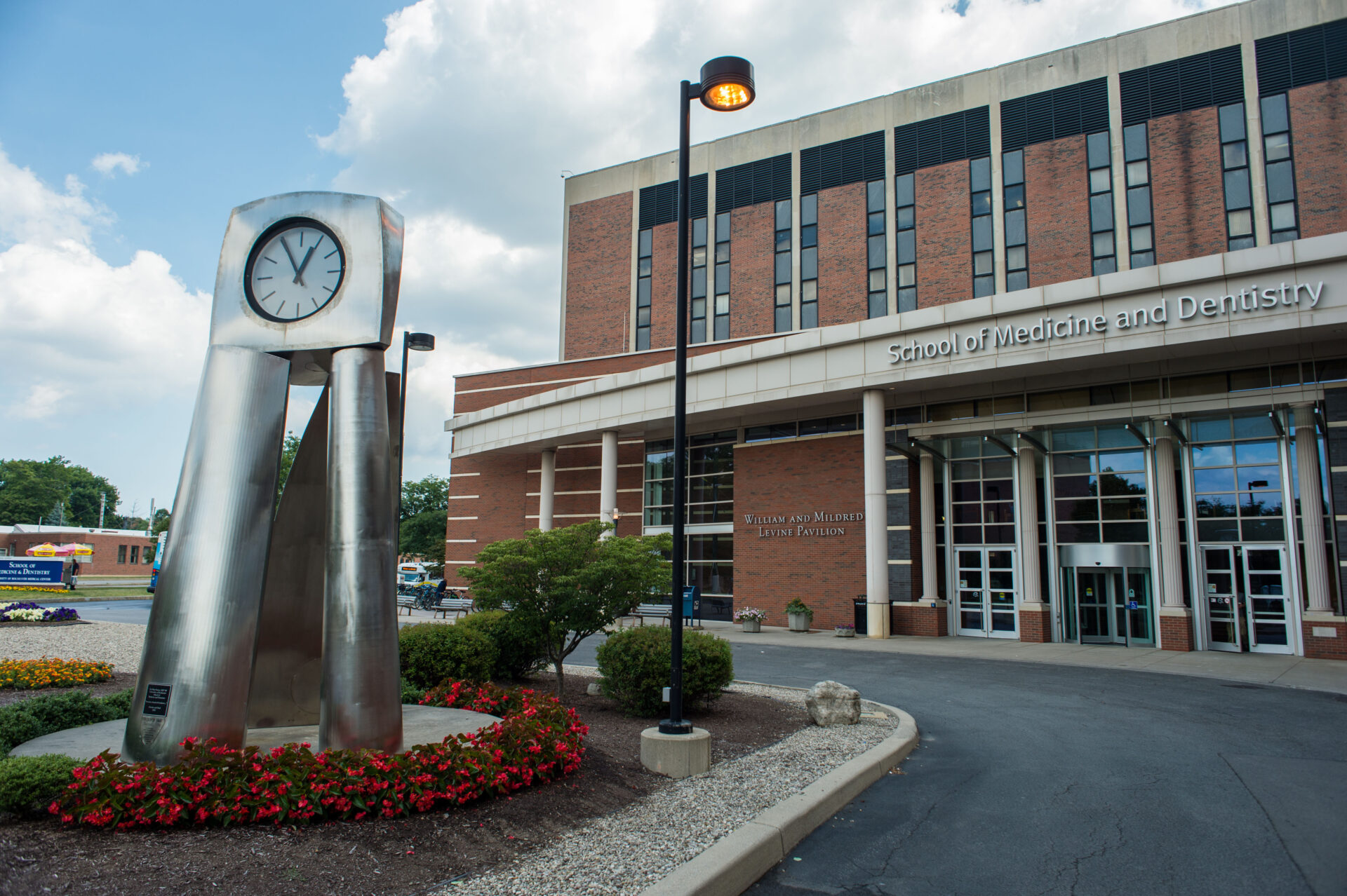 Photograph of front of the School of Medicine and Dentistry in summer
