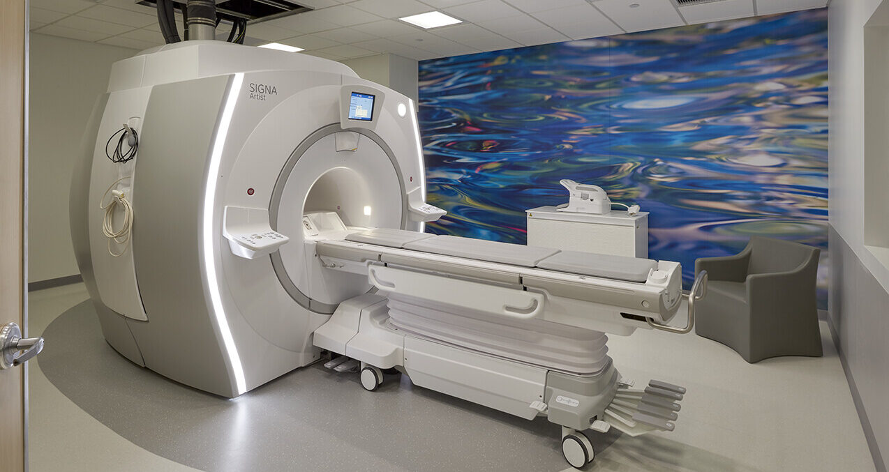 New MRI scanner in patient care room.